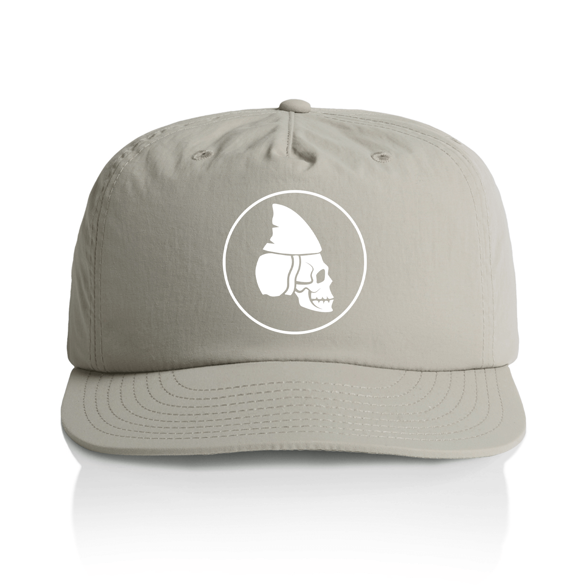 A grey quick dry baseball cap with a white circular graphic on the front featuring a stylized skull wearing a shark fin helmet, shown against a clean white background.