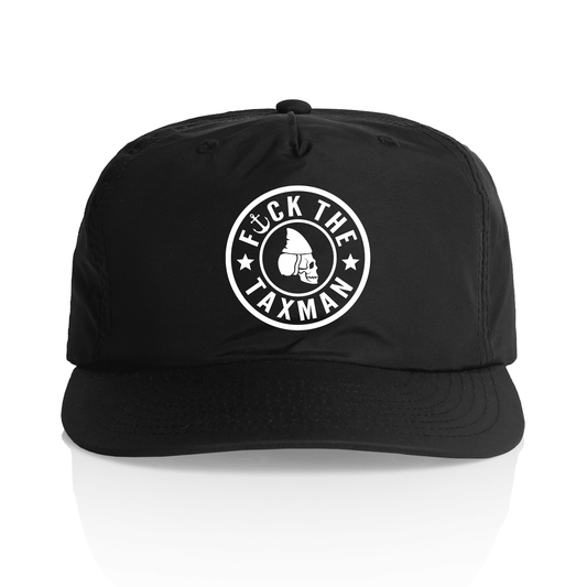 A black five-panel snapback cap with a white circular graphic on the front that reads 'F*CK THE TAXMAN' around a taxman illustration, shown on a white background with a soft reflection.